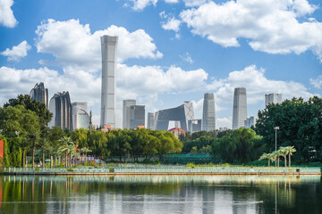 Fototapeta na wymiar Reflection on the water surface of Beijing CBD buildings