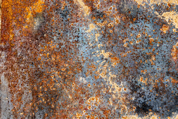 Rust on a metallic red texture