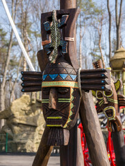 Decoration stylized as a totem pole on the playground in the park