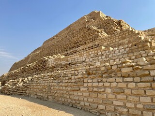 Close-up shot of the ancient Egyptian pyramid in the daytime