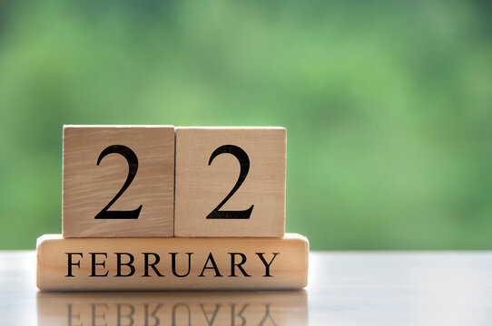February 22 calendar date text on wooden blocks with customizable space for text or ideas. Copy space