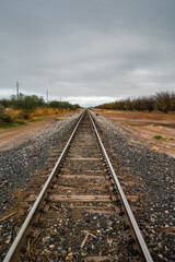Fototapeta na wymiar Vintage Railroad leading off into distance