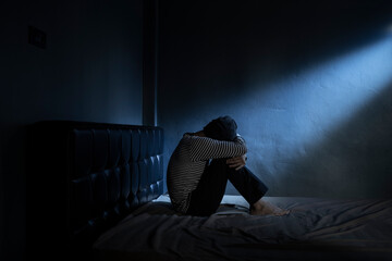 sad man in the dark room