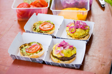 Tropical hamburgers packed in a box