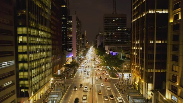 Aerial view of Avenida Paulista (Paulista Avenue) in Sao Paulo city, Brazil at night. Cinematic 4K