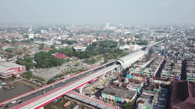 Aerial view of Ampera bridge in Indonesia with traffic during the daytime