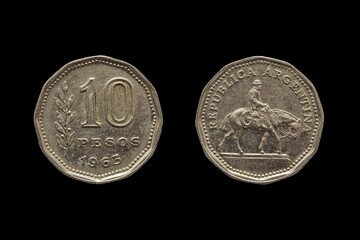 Two pieces of an Argentinian pesos coin