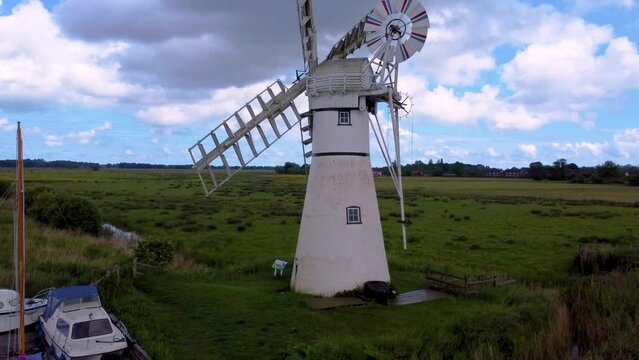 Aerial drone footage of the Thurne Windmill in the Norfolk broads, the UK