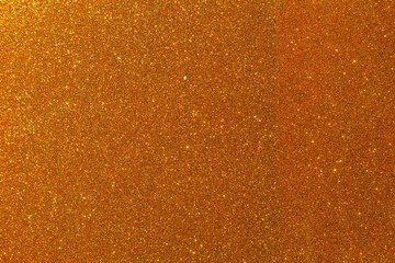 Background with sparkles. Backdrop with glitter. Shiny textured surface. Dark orange Brown tone