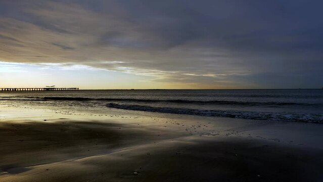 Sunrise on the beach in Coney Island New York City, areal view . High-quality 4k footage