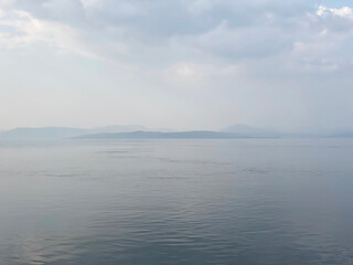 Peaceful calm water during summer at Loch Lomond