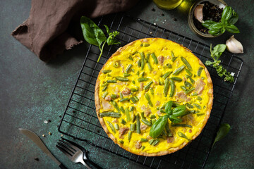 Сlassic quiche Lorraine pie with tuna, green beans and soft cheese. Crustless quiche with eggs, fish and vegetables. Mediterranean ketogenic healthy diet. View from above.