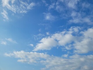 Blue sky with white clouds. Background