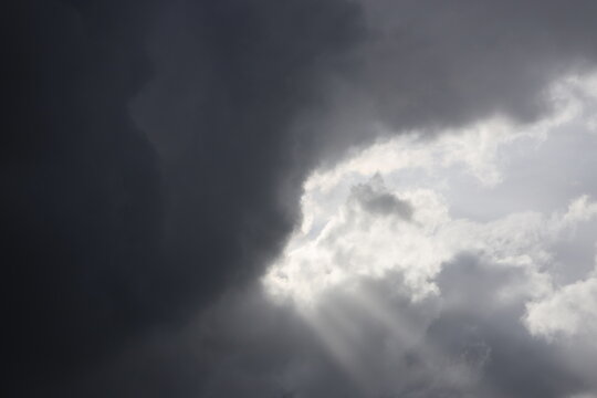 Sun rays through the dark clouds 