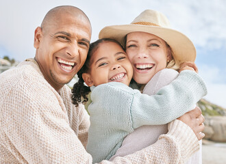 Portrait of happy interracial family on vacation in summer. Smiling and laughing parents bonding...