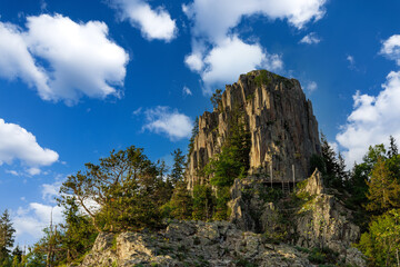 Mountain range of Rhodope Mountains covered with vegetation against the backdrop of valley covered with spruce forests