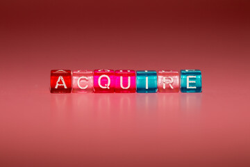 the word "acquire" made up of cubes