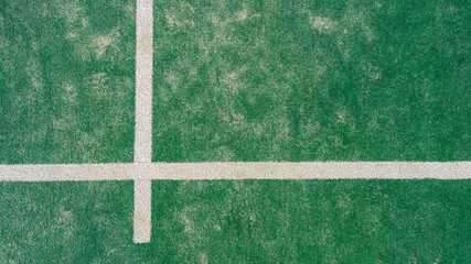 Top view of line on floor and part of green synthetic grass paddle tennis court - obrazy, fototapety, plakaty