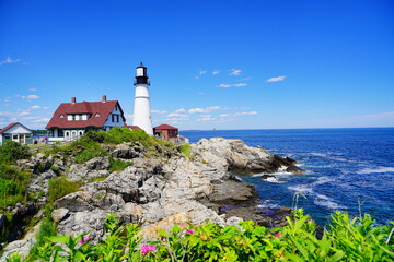 Fototapeta na wymiar Atlantic ocean waves and rock beach along coastline in Portland, Maine, USA