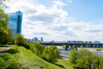 Fototapeta premium Moscow-City and Moscow-river area, Russia. modern architecture. Moscow City and skyscraper Moscow International Business Center in daytime against the blue sky with place for text