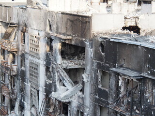 War in Ukraine. The ruins of residential buildings burned down and destroyed by Russian troops in Mariupol.