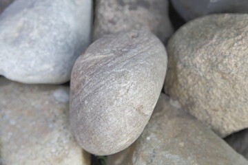 Fototapeta na wymiar Stones of a round, even shape close-up.