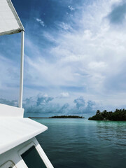 View from yacht on a two tropical islands in ocean