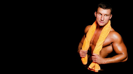 Young attractive guy in the bathroom after a shower.