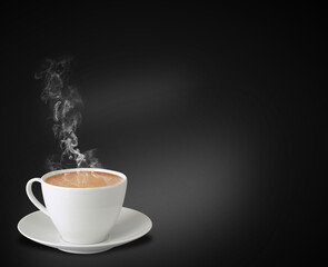 cup of coffee with milk on black background