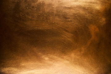 Liquid fluid art abstract background. Ocher jets and smoke rings dancing acrylic paints underwater, space ocean, color explosion