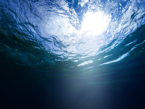 Underwater waves scene with  light rays