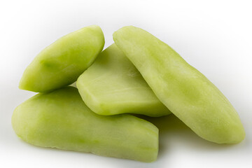 Peeled raw chayote isolated on white background.