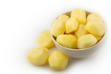 Peeled raw potatoes isolated on white background.