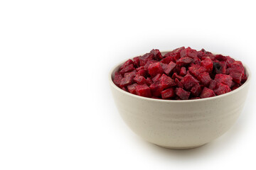 Diced raw beetroot isolated on white background.