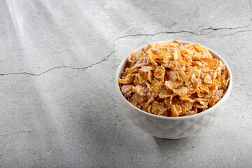 Sugared corn flakes in the bowl.