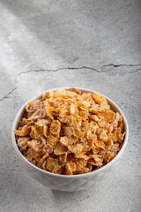 Sugared corn flakes in the bowl.