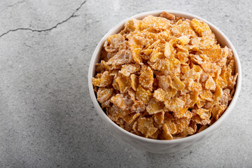 Sugared corn flakes in the bowl.