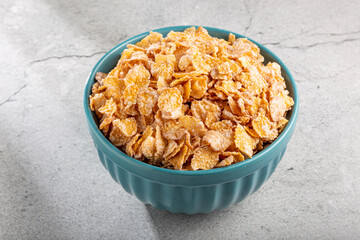 Sugared corn flakes in the bowl.