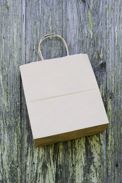 caft paper eco paper bag on wooden background