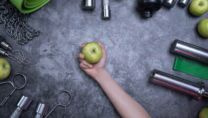 Sport concept. Fitness concept. Sport photo. Man hand green apple. Fit. Diet. 