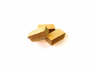 Lot of tasty wafer sticks on white background, flat lay. Sweet food.