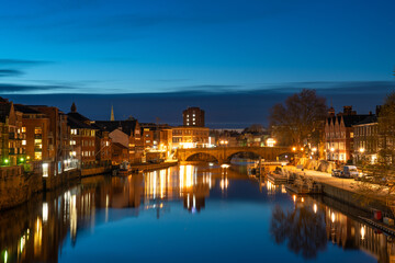 Fototapeta na wymiar York cityscape seen across river Ouse at dusk. England 