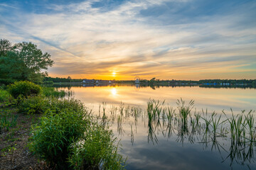 Willen Lake south bay at sunset in Milton Keynes. England