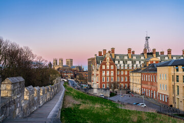 The city of York in England with its medieval wall and the York Minster at sunset
