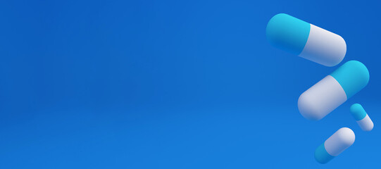 A group of antibiotic pill capsules falling. Healthcare and medical 3d rendering background.