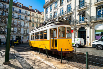 Naklejka na ściany i meble Famous Tram 28 in Lisbon on sunny day. Portugal