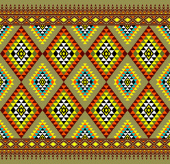 Yellow Green Symmetry Geometric Ethnic Seamless Pattern on Flat Green Background