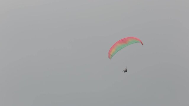 Paragliding Recreational Competitive Adventure Sport of Flying Paragliders from Hilltop in Puncak Cisarua Bogor, Indonesia