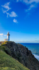 Fototapeta na wymiar Cape Byron Lighthouse on clear sunny day, Byron Bay Australia