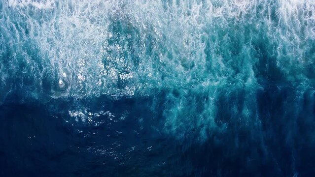 Top-down aerial view of the powerful deep blue ocean waves during the monsoon season amazing video Tropical Sea Andaman Sea : 4K Video High quality Apple ProRes HQ